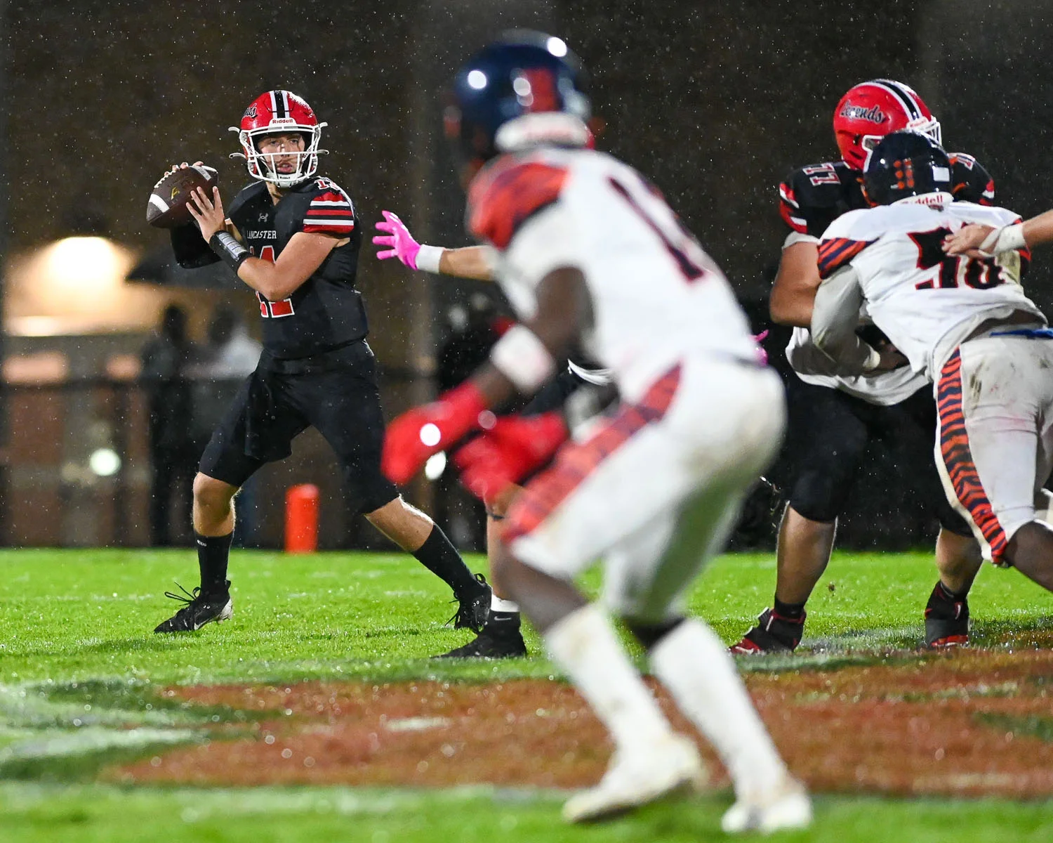 QB looking down the field for the WR