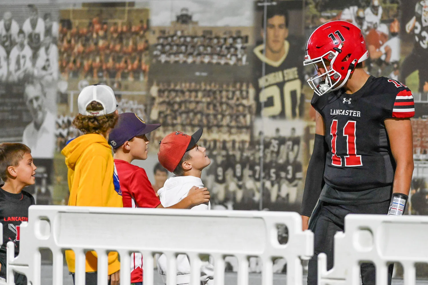 Lancaster Player talking to the kids