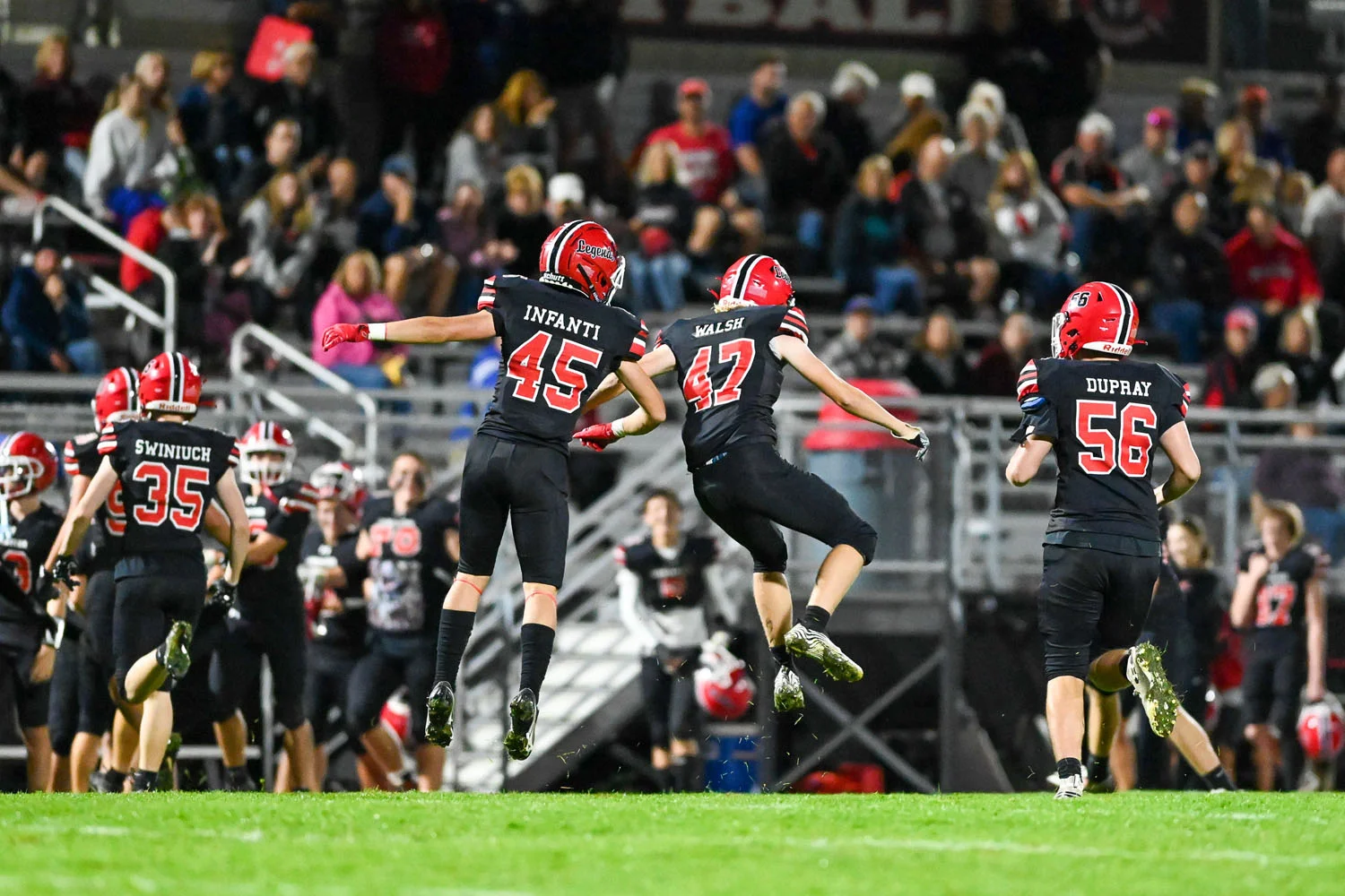 Lancaster players jumping in celebration