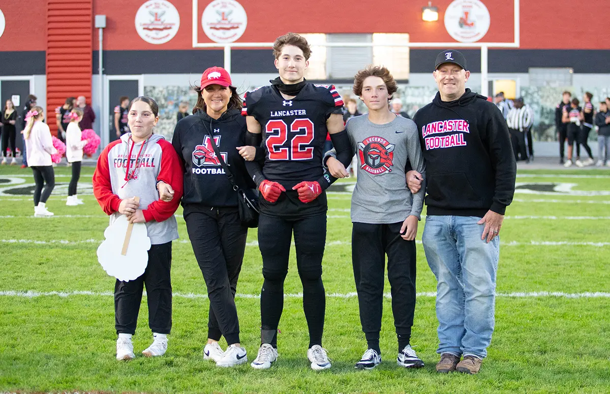Lancaster Legend Football Senior Michael Falls and family